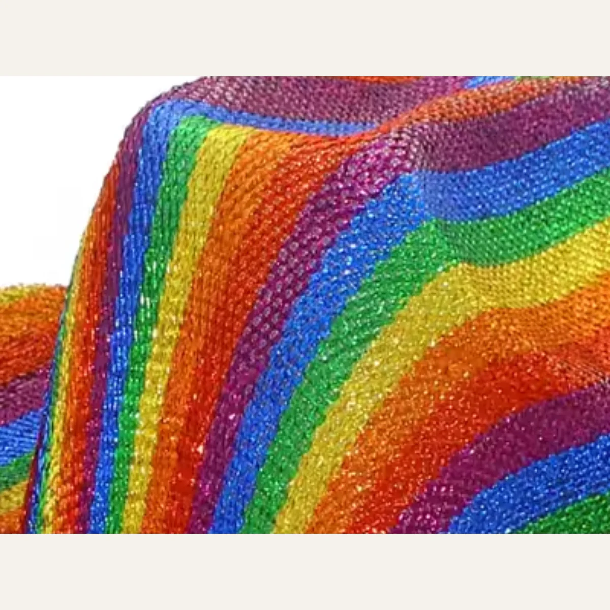 Close-up of rainbow sequin stripe texture on multi-color disco cowboy hat