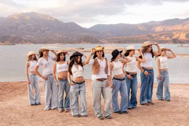Group of women in cowboy hats celebrating a disco cowgirl bachelorette party outdoors