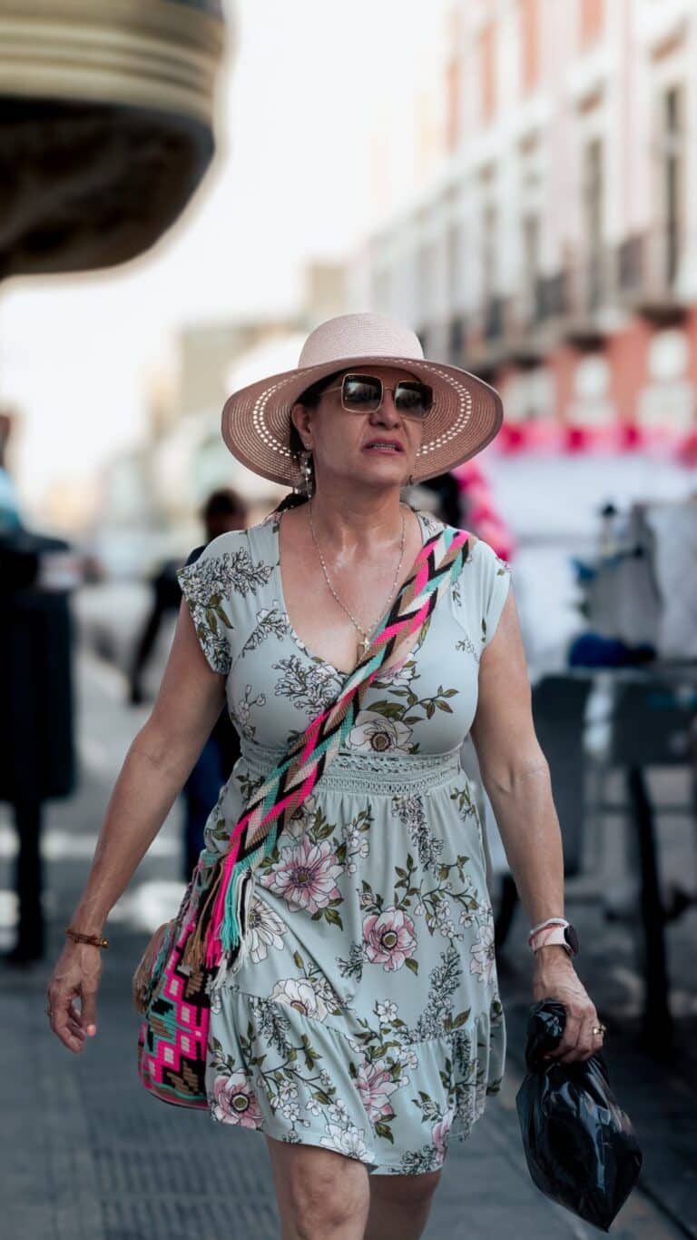 Street style outfit featuring a cowboy hat paired with jeans for everyday wear